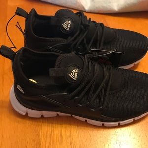 Boys Reebok black & white sneakers